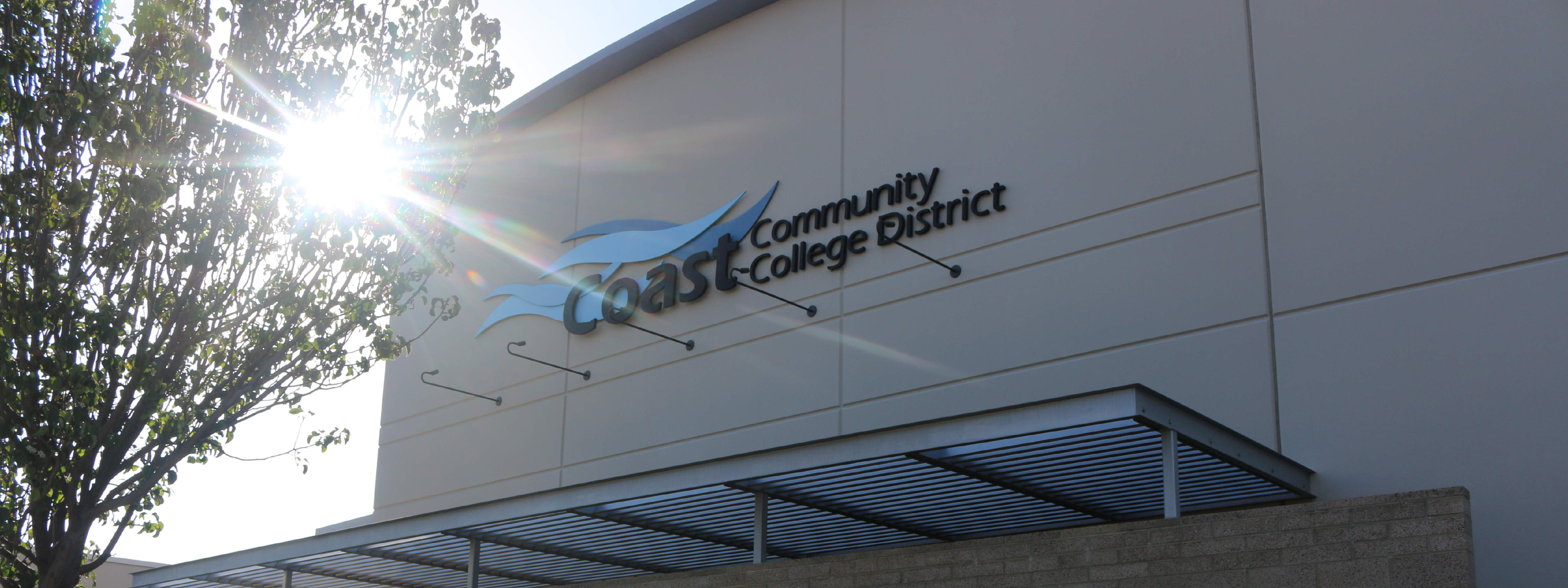 Coast Community College District building with logo